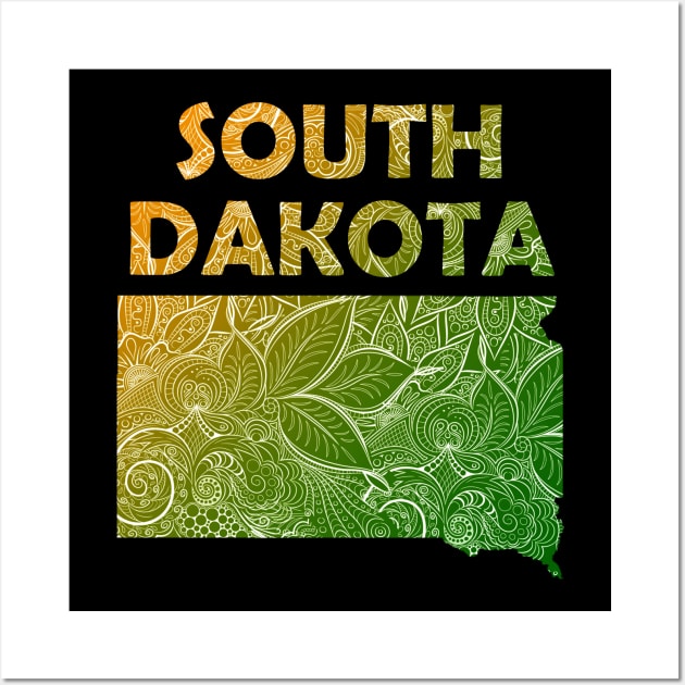 Colorful mandala art map of South Dakota with text in green and orange Wall Art by Happy Citizen